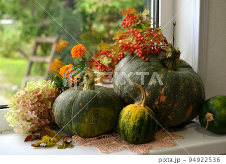 Vintage still life with pumpkins and decorations on the window ceiling inside, thanksgiving day background, fall calendar season concept 94922536