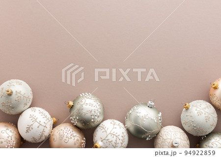 Christmas balls on powdery background Christmas balls on powdery background 94922859