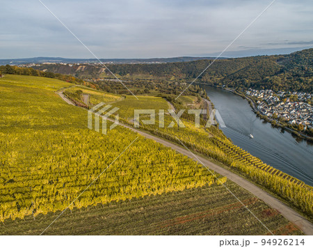 Aerial view Famous German Wine Region Moselle River Lay and Guels village Autumn Fall colors Aerial view Famous German Wine Region Moselle River Lay and Guels village Autumn Fall colors 94926214