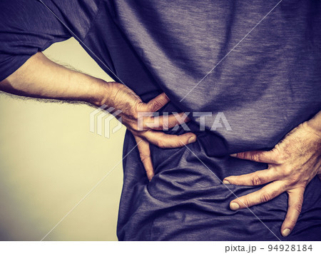 Man having back loins pain ache Man having back loins pain ache 94928184