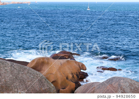 Bizarre boulders on the Pink Granite Coast in Brittany 94928650