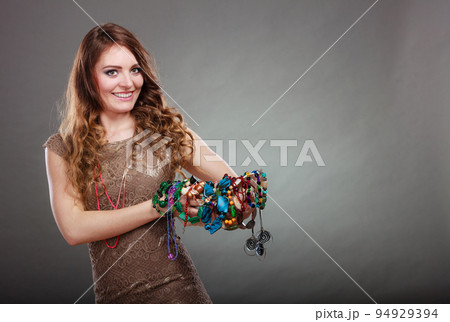 Pretty woman with jewelry necklaces beads and hat. Pretty woman with jewelry necklaces beads and hat. 94929394
