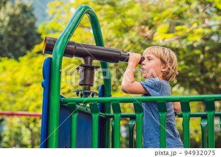 Funny cute happy baby playing on the playground. The emotion of happiness, fun, joy 94932075