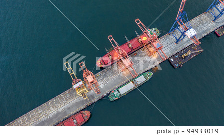 Aerial top view large general cargo ship bulk carrier, Bulk carrier dock, Global business import export logistic and transportation company, Commercial dock container cargo vessel freight shipping. 94933019
