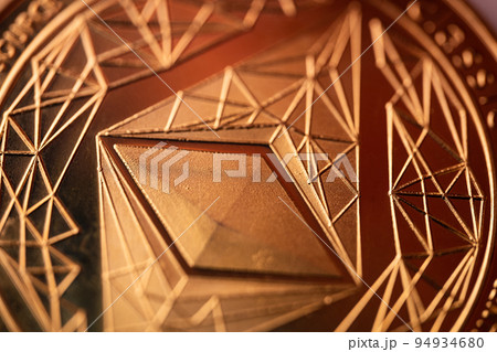 top view extreme macro closeup of crypto ethereum golden coin symbol logo 94934680