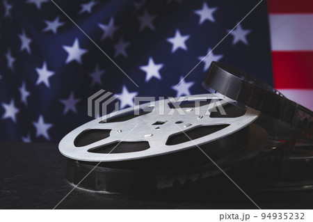 American cinema. Cinematography in the USA. Old film reel. 94935232