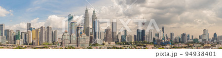 Kuala Lumpur skyline, view of the city, skyscrapers with a beautiful sky in the afternoon Kuala Lumpur skyline, view of the city, skyscrapers with a beautiful sky in the afternoon 94938401