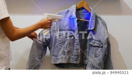 UV Light alcohol spray for cleaning the blue jean jacket UV Light alcohol spray for cleaning the blue jean jacket 94940321