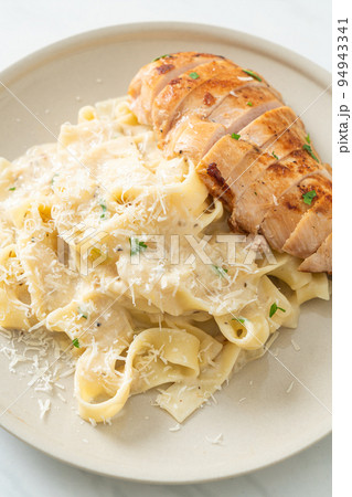 fettucine pasta white creamy sauce with grilled chicken fettucine pasta white creamy sauce with grilled chicken 94943341