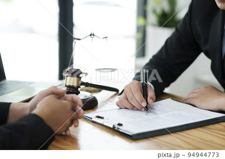 Attorney or lawer consulting client about his offense. 94944773