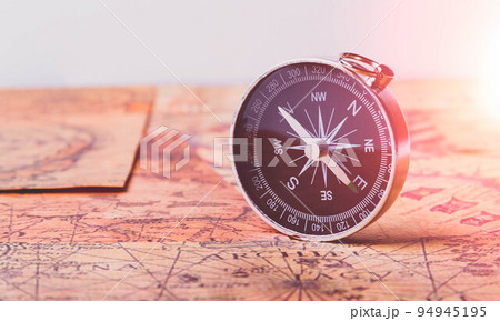 Looking for adventure. Compass and maps. Treasure map and path to the treasure. 94945195