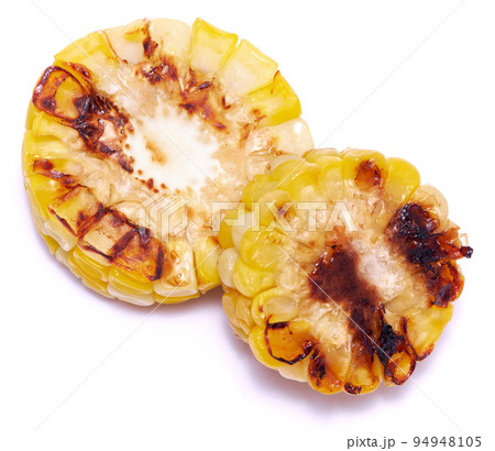 Grilled Slices of corn cobs with stripes from a grill isolated on white background 94948105