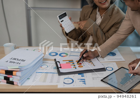 Asian Business consulting meeting and brainstorming new business plan finance investment 94948261