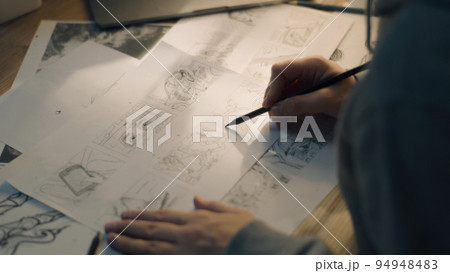 Female animator creates pencil sketch works on the storyboard creative art work 94948483