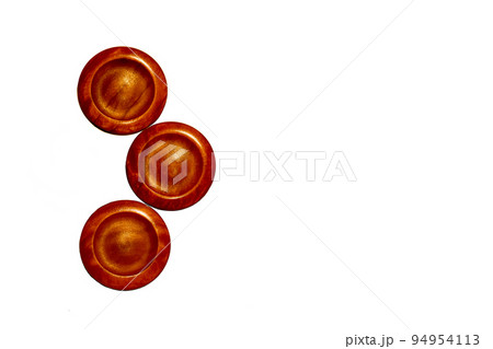 Three red copper wooden isolated circles. Elements of art and decoration Three red copper wooden isolated circles. Elements of art and decoration 94954113