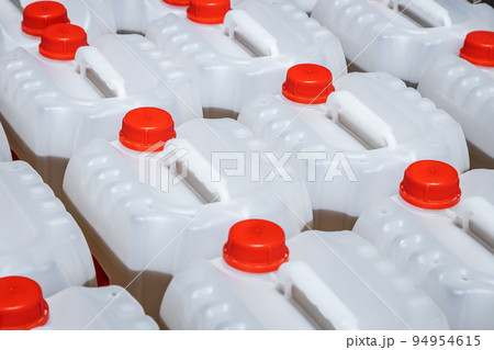 light-colored plastic cans in stock, production, factory 94954615