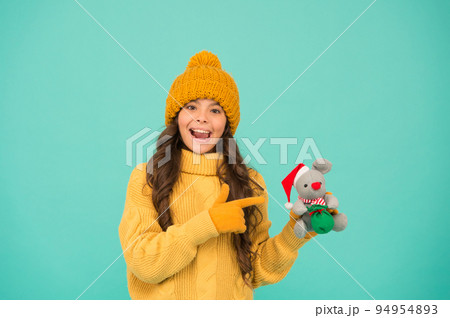 Pleasant shopping. child knitted warm outfit play with toy rat. toy shop for kids. buy christmas presents. being in xmas mood. happy new 2020 year. mouse symbol of year. little girl hold mouse toy Pleasant shopping. child knitted warm outfit play with toy rat. toy shop for kids. buy christmas presents. being in xmas mood. happy new 2020 year. mouse symbol of year. little girl hold mouse toy 94954893