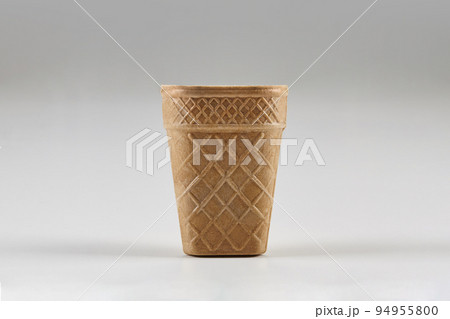 Empty, big wafer cup for ice cream isolated on white background. Concept of food, treats. Mockup, template for your advertising and design. Close up 94955800