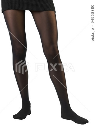Slender female legs in tight tights with a tightening effect Slender female legs in tight tights with a tightening effect 94958380