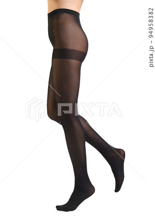 Slender female legs in tight pantyhose with a tightening effect Slender female legs in tight pantyhose with a tightening effect 94958382