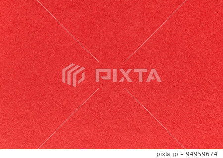 Texture of bright red and ruby colors paper background, macro. Structure of dense craft garnet cardboard. Texture of bright red and ruby colors paper background, macro. Structure of dense craft garnet cardboard. 94959674