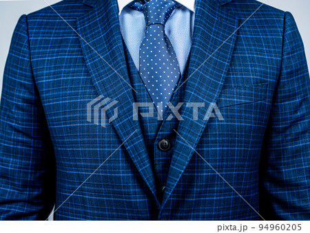 Matching tie with suit. Blue suit worn with classic tie. Necktie collection. Fashion mens accessory. Formal style. Business meeting. Polka dots will brighten up your office attire 94960205