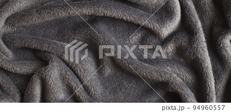 Gray wrinkled plush fabric background texture, soft material