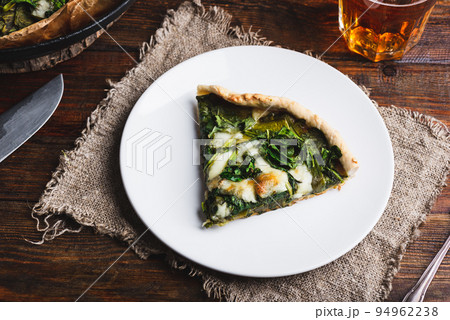 Spinach Galette Pie with Parmesan and Chives 94962238