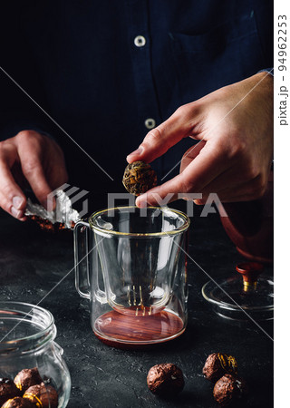 Steeping tea in glass mug Steeping tea in glass mug 94962253