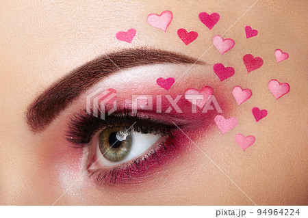 Eye make-up girl with a heart Eye make-up girl with a heart 94964224
