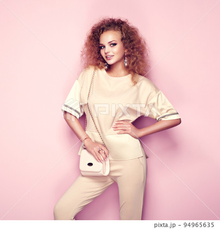 Fashion portrait of woman in summer outfit Fashion portrait of woman in summer outfit 94965635
