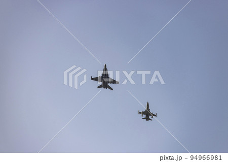 Hunt. Airplane. Military vehicle. Spanish Air Force rehearsing for the National Day of October 12 through the streets of the city of Madrid. MADRID, SPAIN - OCTOBER 5, 2022. Hunt. Airplane. Military vehicle. Spanish Air Force rehearsing for the National Day of October 12 through the streets of the city of Madrid. MADRID, SPAIN - OCTOBER 5, 2022. 94966981