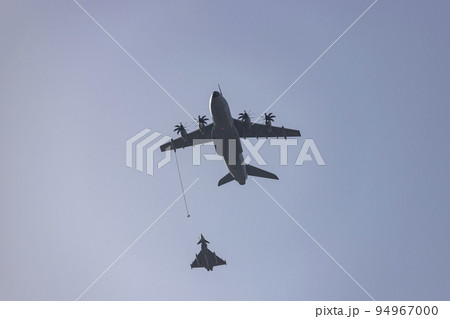 Hunt. Airplane. Military vehicle. Spanish Air Force rehearsing for the National Day of October 12 through the streets of the city of Madrid. MADRID, SPAIN - OCTOBER 5, 2022. Hunt. Airplane. Military vehicle. Spanish Air Force rehearsing for the National Day of October 12 through the streets of the city of Madrid. MADRID, SPAIN - OCTOBER 5, 2022. 94967000