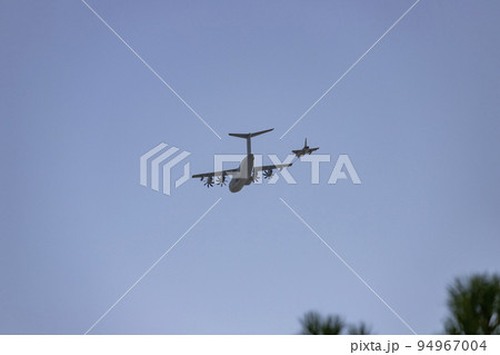 Hunt. Airplane. Military vehicle. Spanish Air Force rehearsing for the National Day of October 12 through the streets of the city of Madrid. MADRID, SPAIN - OCTOBER 5, 2022. Hunt. Airplane. Military vehicle. Spanish Air Force rehearsing for the National Day of October 12 through the streets of the city of Madrid. MADRID, SPAIN - OCTOBER 5, 2022. 94967004