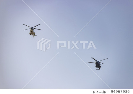Helicopter. Spanish Air Force rehearsing for the National Day of October 12 through the streets of the city of Madrid. MADRID, SPAIN - OCTOBER 5, 2022. 94967986