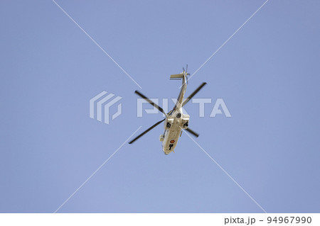 Helicopter. Spanish Air Force rehearsing for the National Day of October 12 through the streets of the city of Madrid. MADRID, SPAIN - OCTOBER 5, 2022. 94967990