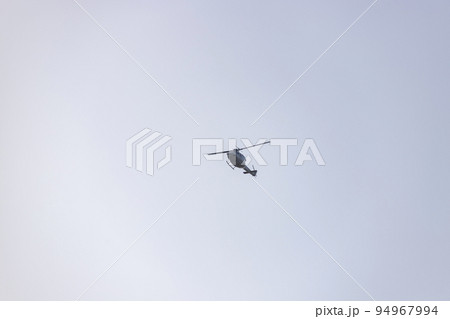 Helicopter. Spanish Air Force rehearsing for the National Day of October 12 through the streets of the city of Madrid. MADRID, SPAIN - OCTOBER 5, 2022. 94967994