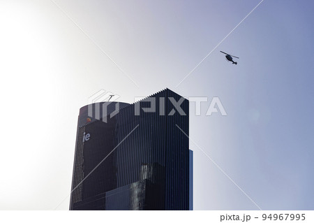 Helicopter. Spanish Air Force rehearsing for the National Day of October 12 through the streets of the city of Madrid. MADRID, SPAIN - OCTOBER 5, 2022. Helicopter. Spanish Air Force rehearsing for the National Day of October 12 through the streets of the city of Madrid. MADRID, SPAIN - OCTOBER 5, 2022. 94967995