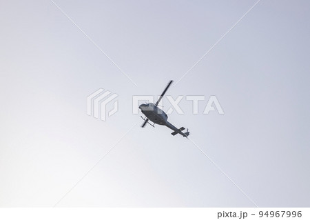 Helicopter. Spanish Air Force rehearsing for the National Day of October 12 through the streets of the city of Madrid. MADRID, SPAIN - OCTOBER 5, 2022. 94967996
