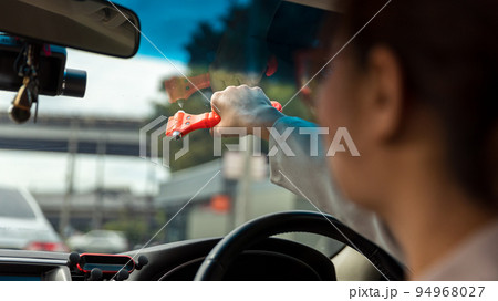 Woman use Safety Hammer and Seatbelt Cutter in Cars,  94968027