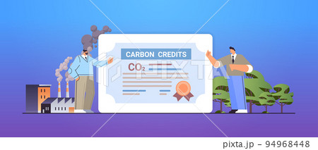 businesspeople signing carbon credits certificate document responsibility of co2 emission free trading carbon tax credit businesspeople signing carbon credits certificate document responsibility of co2 emission free trading carbon tax credit 94968448