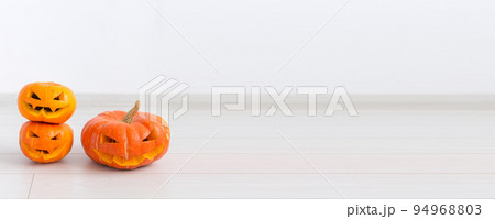 Banner halloween pumpkin heads jack lantern with scary evil faces spooky holiday copy space Banner halloween pumpkin heads jack lantern with scary evil faces spooky holiday copy space 94968803