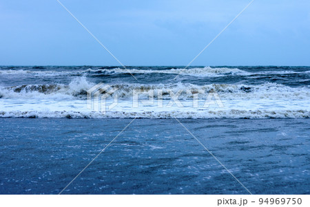 Blue Sea Waves against clear blue sky horizon. Nature Background. 94969750
