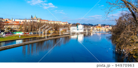 Prague cityscape with Vltava River 94970963