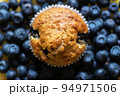 Blueberry muffin on a bluberries. Top view. 94971506