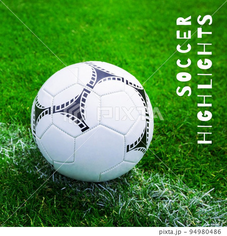 Composition of soccer highlights text over football on grass pitch background 94980486