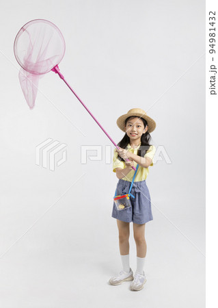 Korean young girl wearing gym clothes in white background studio__insect collecting holding a catch dragonflies Korean young girl wearing gym clothes in white background studio__insect collecting holding a catch dragonflies 94981432