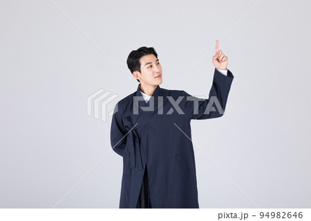 goodlooking Korean young man in 20s wearing modern Hanbok wearing hanbok_hand motion goodlooking Korean young man in 20s wearing modern Hanbok wearing hanbok_hand motion 94982646