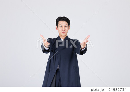 goodlooking Korean young man in 20s wearing modern Hanbok wearing hanbok_hand motion goodlooking Korean young man in 20s wearing modern Hanbok wearing hanbok_hand motion 94982734