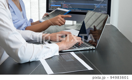 Team of programmers working with computer programming, professional development, and coding technology, working on high-quality visual software development websites Team of programmers working with computer programming, professional development, and coding technology, working on high-quality visual software development websites 94983601